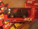 Метална количка Welly - 2007 Jeep Wrangler Rubicon 1:34 - Image 2